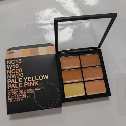 Open makeup palette showing six cream concealer shades arranged in two rows
