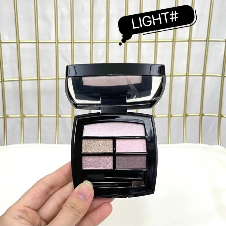 Five shimmer eyeshadow shades in warm tender colors arranged in palette