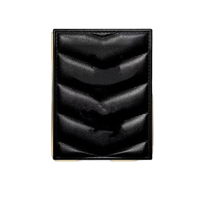 Four eyeshadow shades displayed in a rectangular compact palette