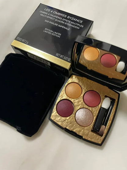 Close-up view of matte and shimmer eyeshadow textures in palette