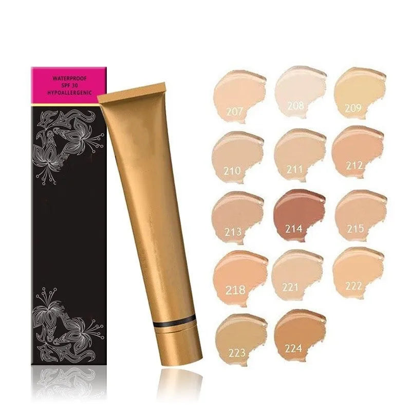 Gold tube of liquid concealer with applicator tip