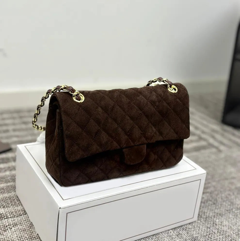 Side view displaying adjustable shoulder strap and bag dimensions