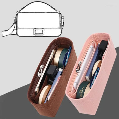 Black felt organizer placed inside a handbag to demonstrate fit and use