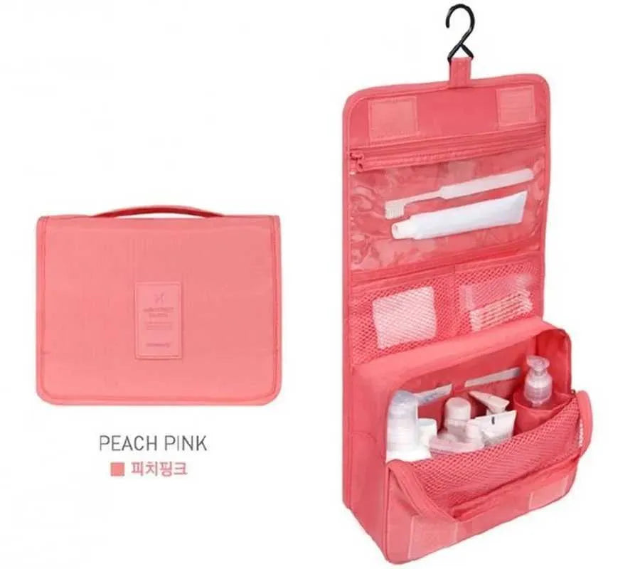 Hanging cosmetic bag displayed with travel accessories