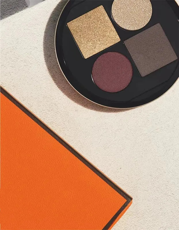 Close-up view of eyeshadow shades showing petal, vegetal, and fauve colors