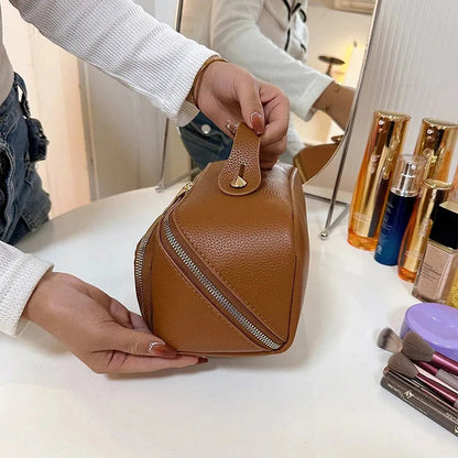Waterproof travel makeup bag with zippered closure and handle