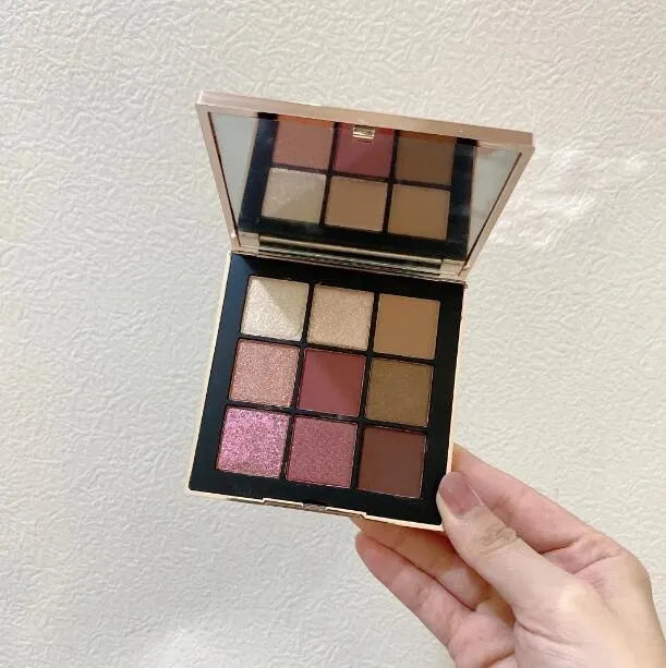 Close-up of eyeshadow palette showing texture and color details