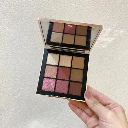 Close-up of eyeshadow palette showing texture and color details