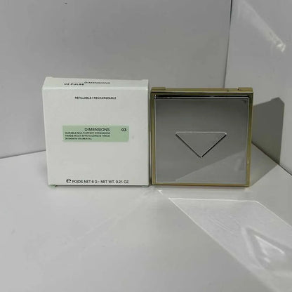 Eyeshadow palette with open lid displaying multiple color options