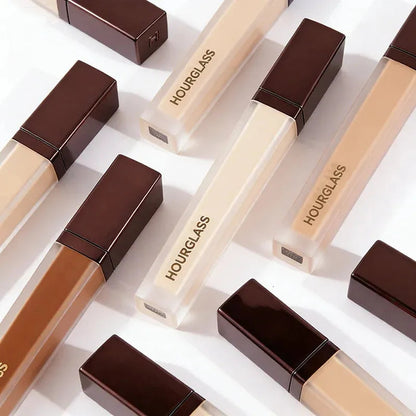 Close-up of concealer being blended on skin surface
