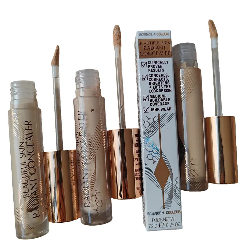 Close-up of concealer being applied to under-eye area with fingertip