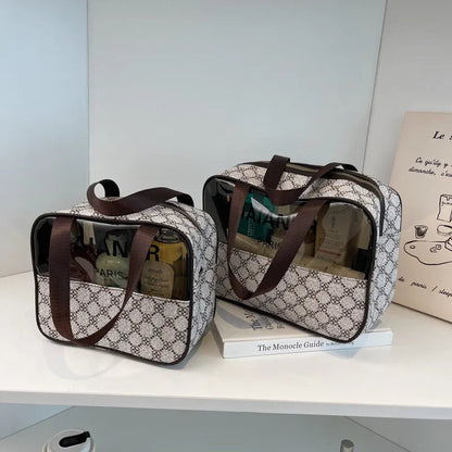 Portable toiletry bag in neutral color with structured compartments visible