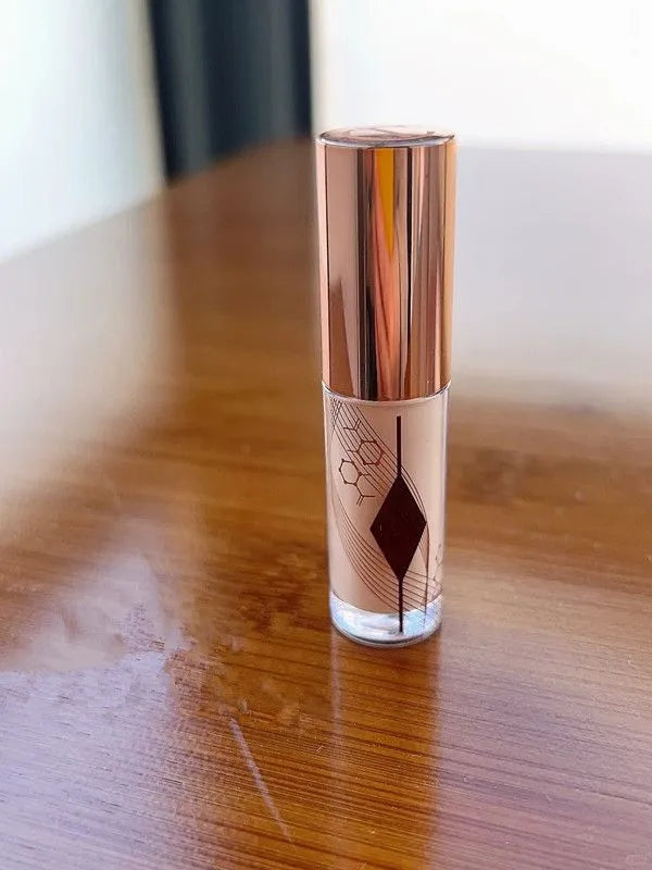 Close-up view of concealer cream being applied to skin