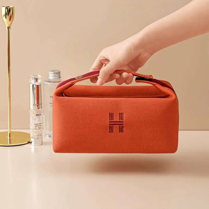 Handheld makeup bag in blue color with Japanese-style aesthetic