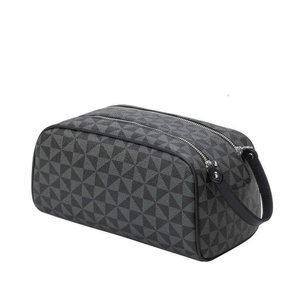 Leather cosmetic bag with double zipper closure in closed position