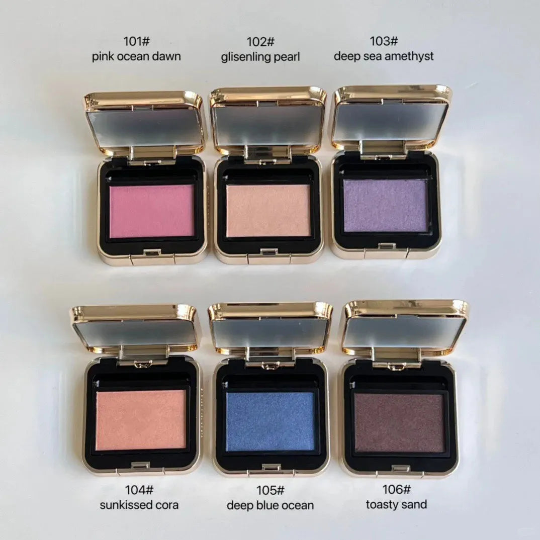 Eyeshadow palette open with six numbered color pans