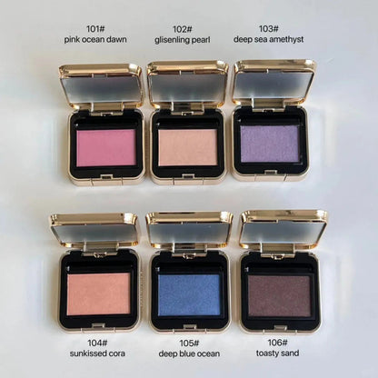 Eyeshadow palette open with six numbered color pans