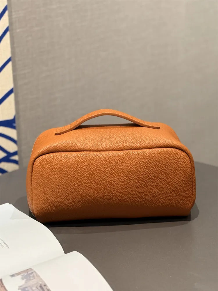 Leather cosmetic bag in multiple color options display