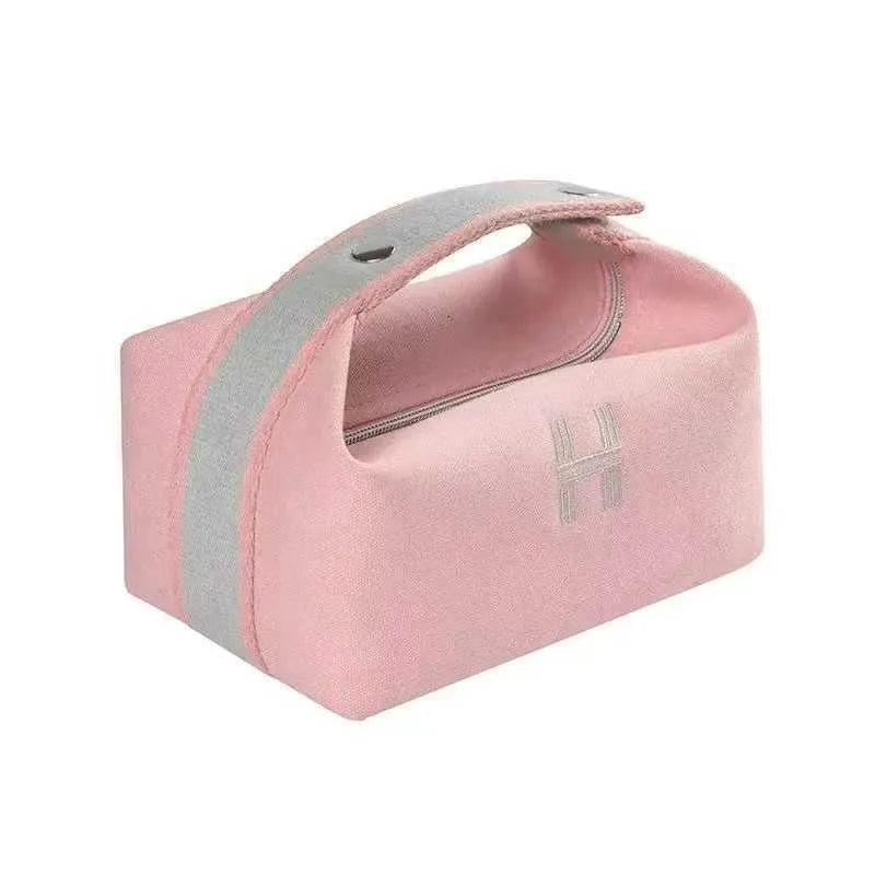 Portable travel cosmetic bag in beige white color