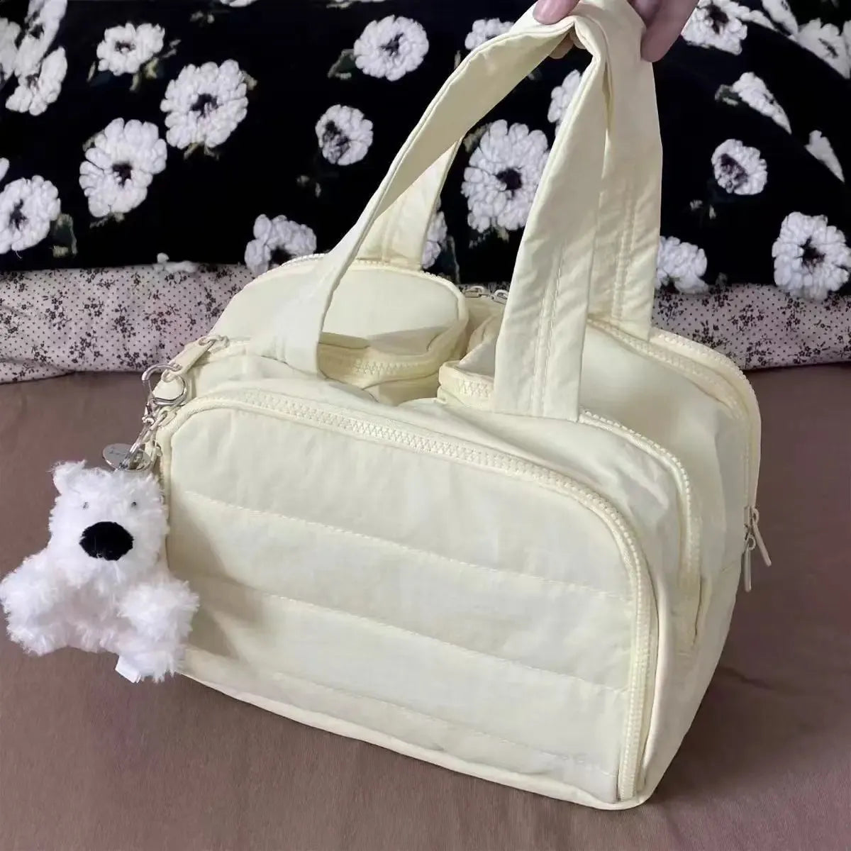 Side view showing the handheld design and compartments