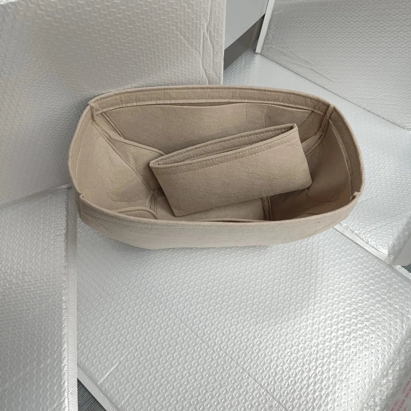 Close-up view of wallet-style compartments inside organizer