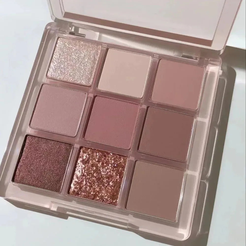 Nine-color eyeshadow palette showing butter orange and brown shades