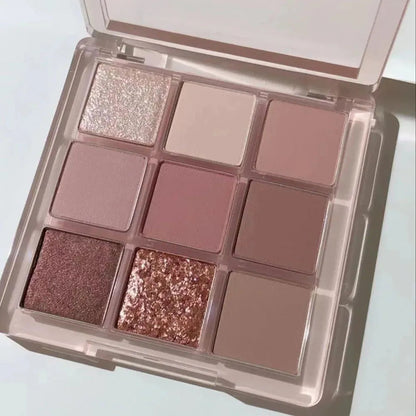 Nine-color eyeshadow palette showing butter orange and brown shades