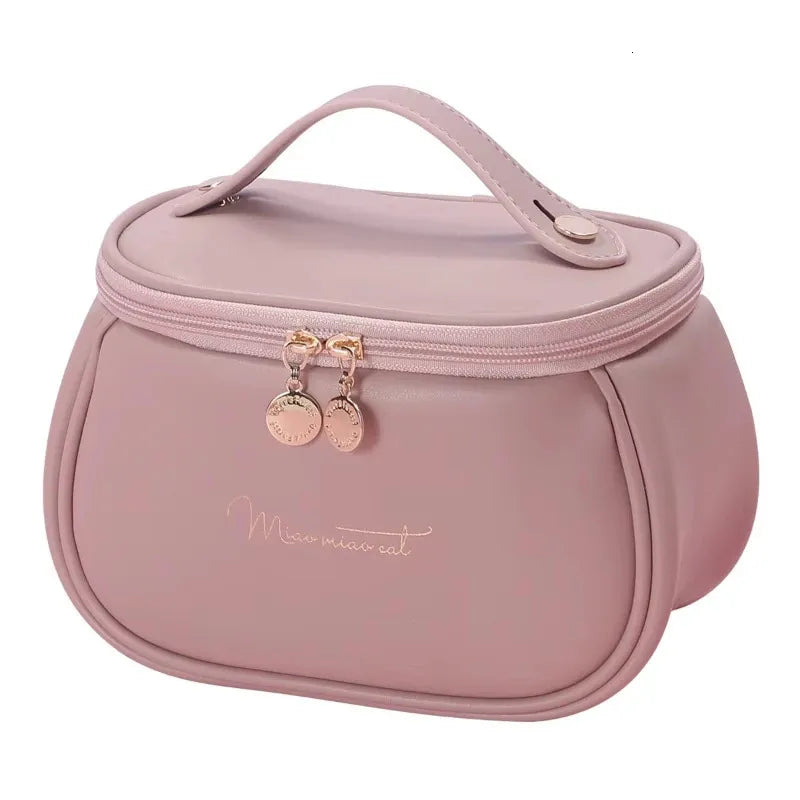 Front view of a PU leather cosmetic bag with multiple compartments