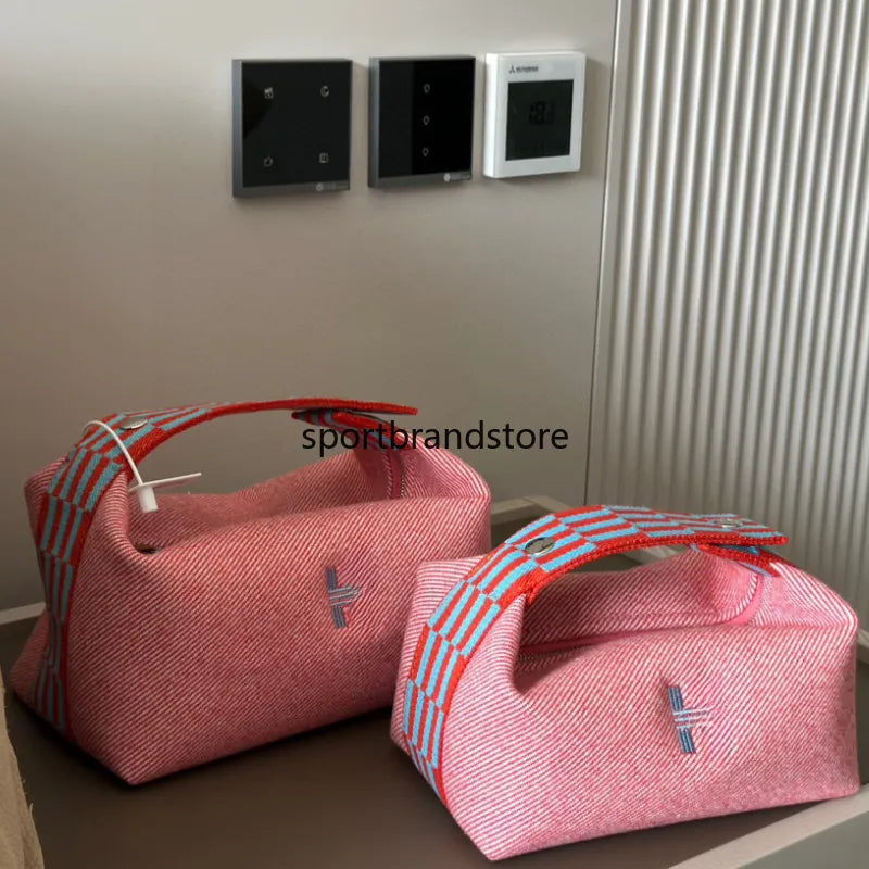 Structured mini box vanity case showing interior compartments