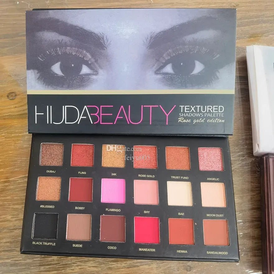 Open 18-color eyeshadow palette showing various shades