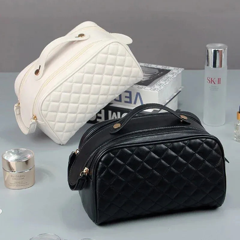 Front view of a portable makeup bag in a neutral color