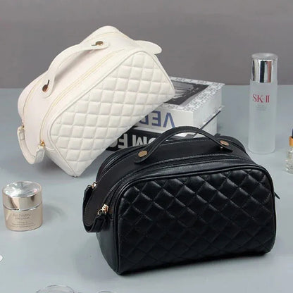 Front view of a portable makeup bag in a neutral color