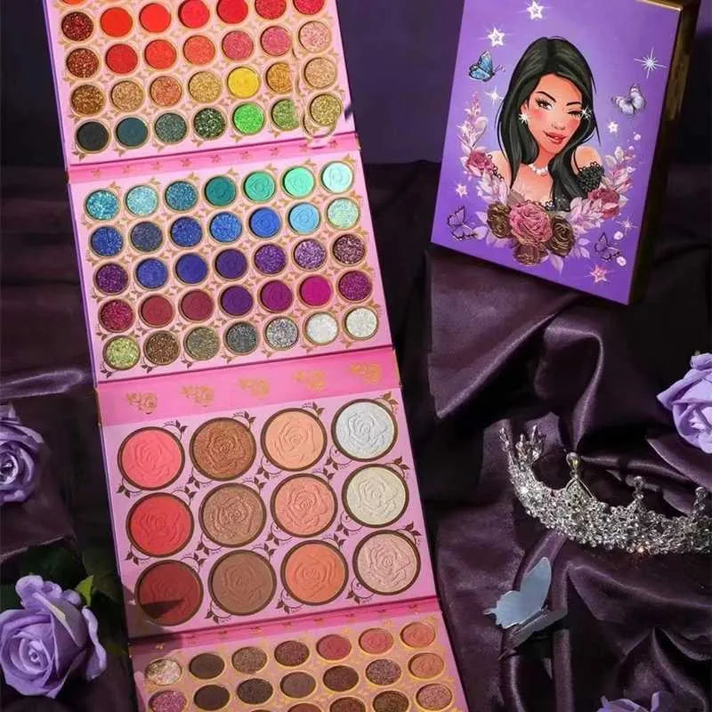 Open 117-color eyeshadow palette showing four pages of makeup pigments