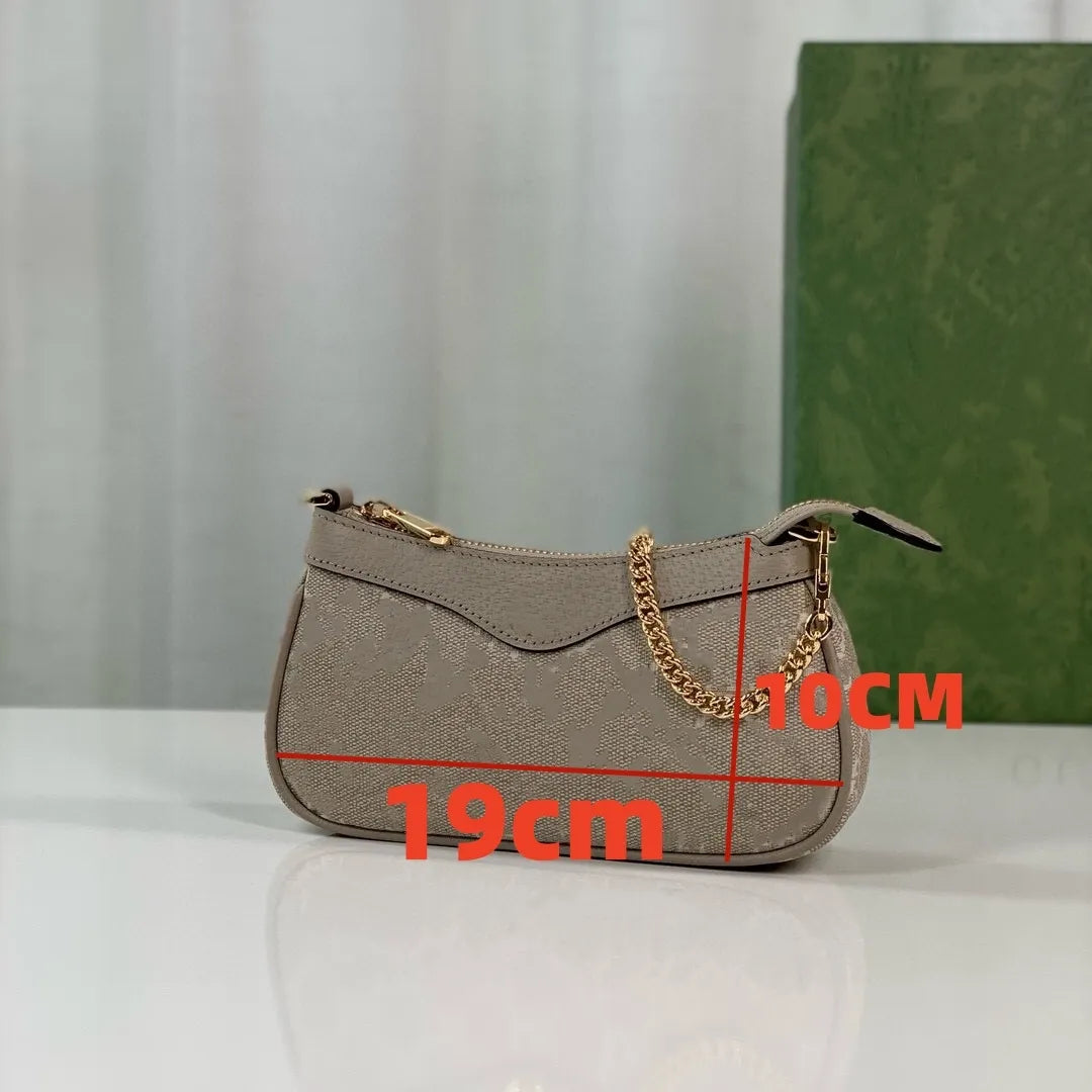 Side angle showing the adjustable strap and zipper closure of the bag