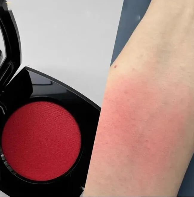 Close-up of blush colors with application brush