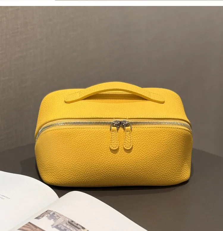 Leather cosmetic bag in multiple color options display