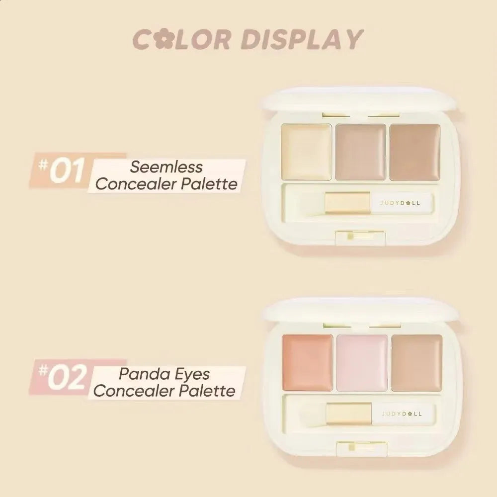 Open palette showing cream concealer shades in a compact case