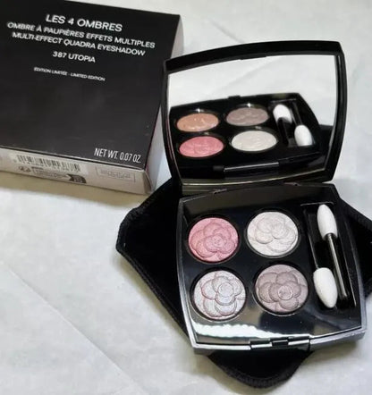 Eyeshadow palette open showing matte and shimmer powder textures