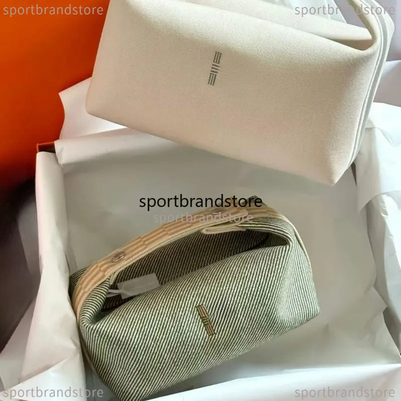 Compact vanity case in lavender color with shoulder strap