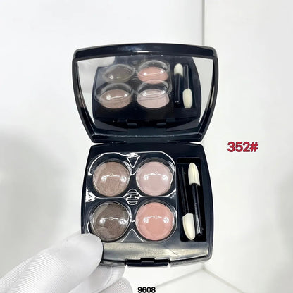 Four-color eyeshadow palette with coordinated shades in a compact case