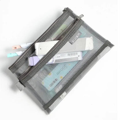 Transparent mesh pencil case showing interior organization