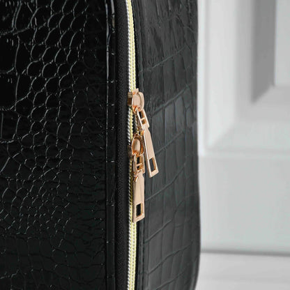 Makeup bag interior showing multiple storage compartments