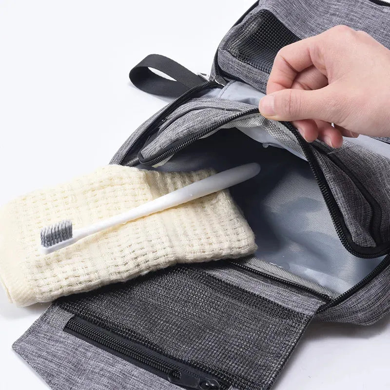 Open folding cosmetic organizer showing interior compartments and organization features