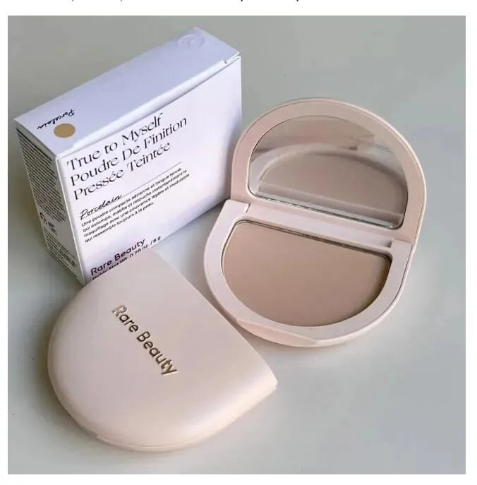 Close-up view showing the fine texture of the pressed powder in one compact