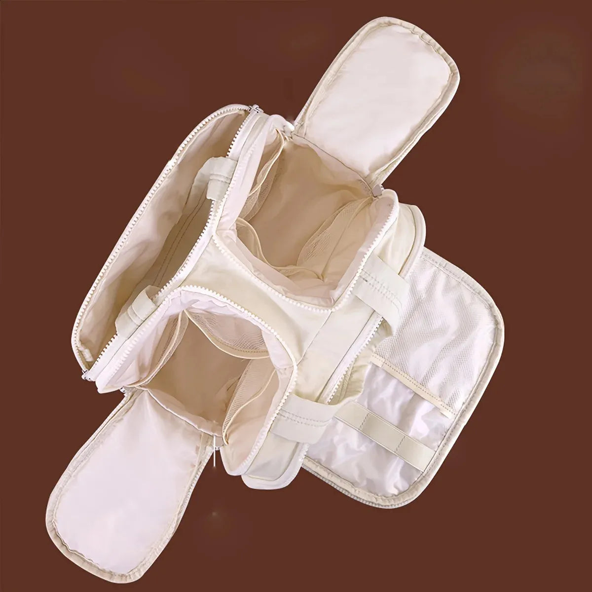 Cosmetic storage bag in use with makeup and toiletry items organized inside