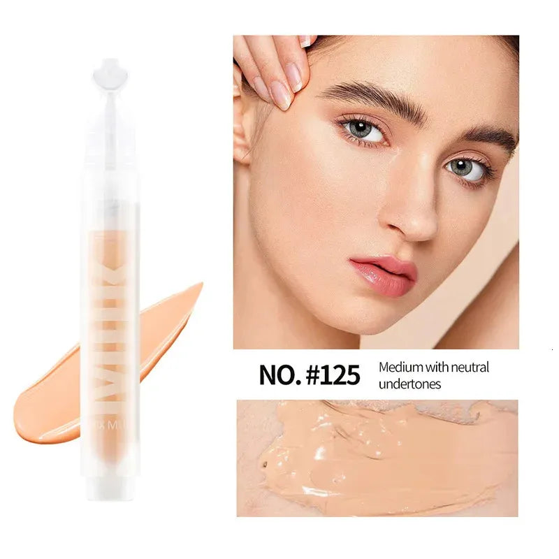 Close-up view of concealer being applied to skin