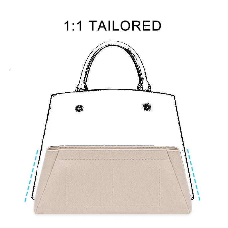 Deep grey cosmetic organizer placed inside a compatible handbag model