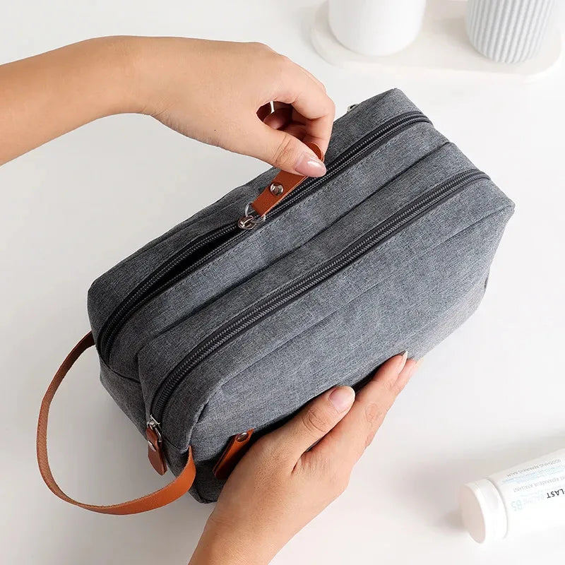 Men's waterproof canvas toiletry bag with leather handle in black color