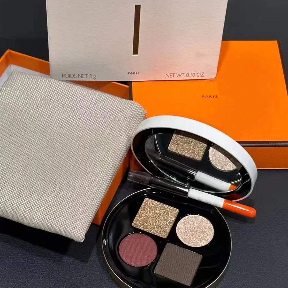 Four-color eyeshadow palette with glitter and matte finishes in earth tones