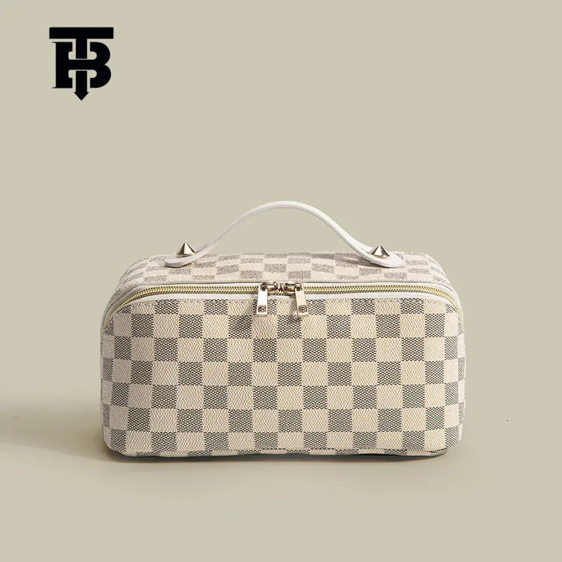 Front view of retro checkered makeup bag showing pattern and handheld strap